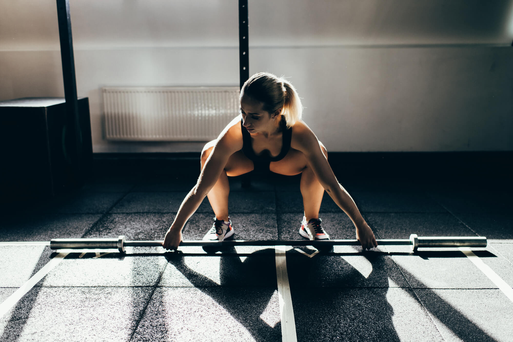 young-athletic-sportswoman-squatting-while-lifting-WXCD89D.jpg young-athletic-sportswoman-squatting-while-lifting-WXCD89D.jpg